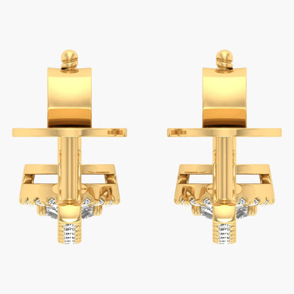 Gold cufflinks with diamond accents on a white background