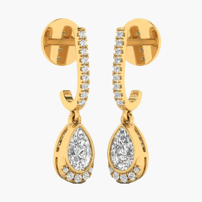 Gold earrings with teardrop-shaped diamonds on a white background