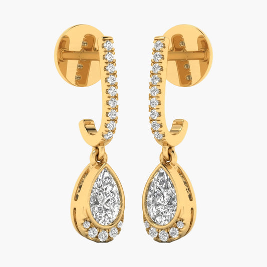 Gold earrings with teardrop-shaped diamonds on a white background