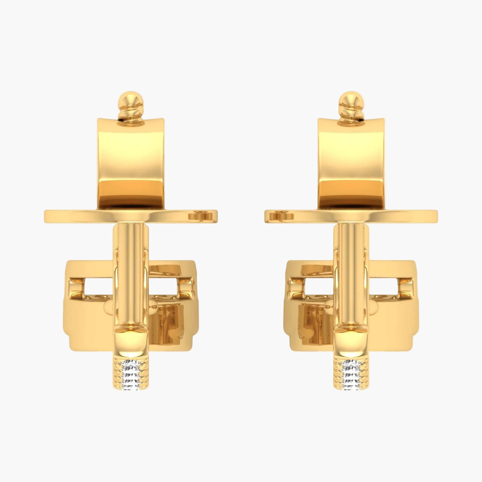 Pair of gold cufflinks on a white background