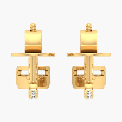 Pair of gold cufflinks on a white background