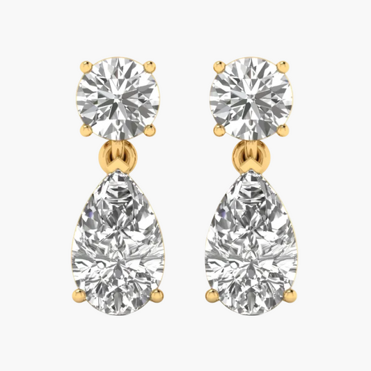 Diamond earrings displayed on a website with a blurred background