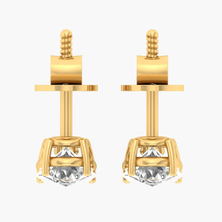 Gold earrings with gemstones displayed on a white background