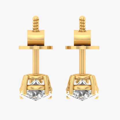 Gold earrings with gemstones displayed on a white background