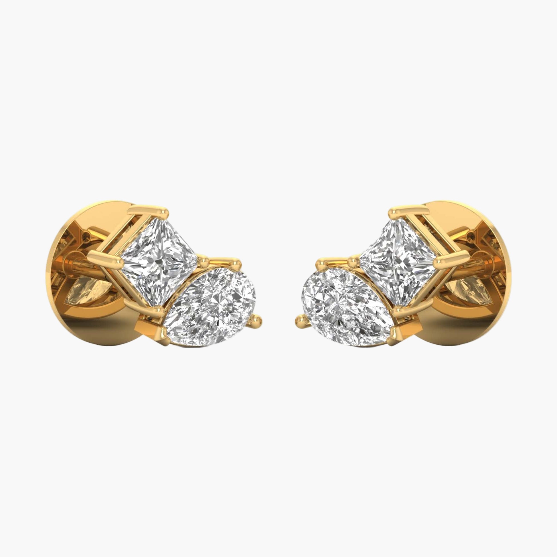 Gold earrings with clear gemstones on a white background