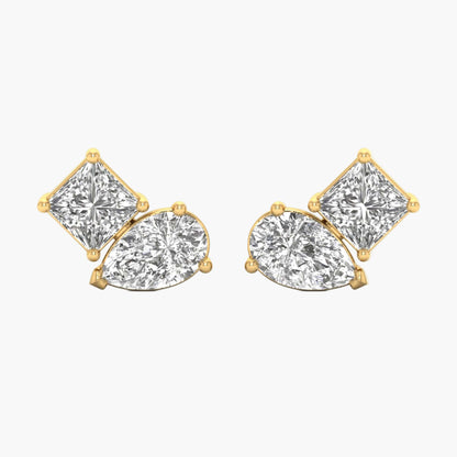 Gold earrings with clear gemstones on a white background