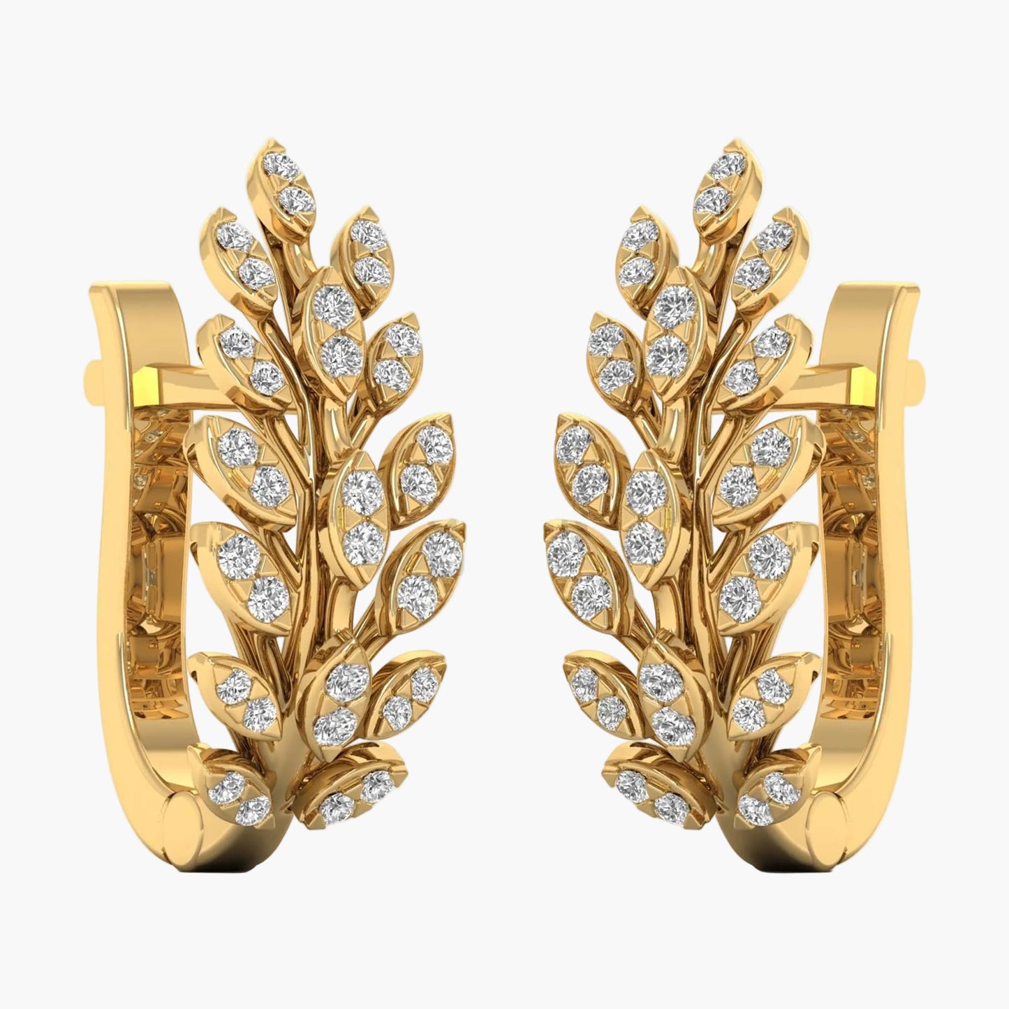 Gold earrings with leaf design and embedded diamonds on a white background