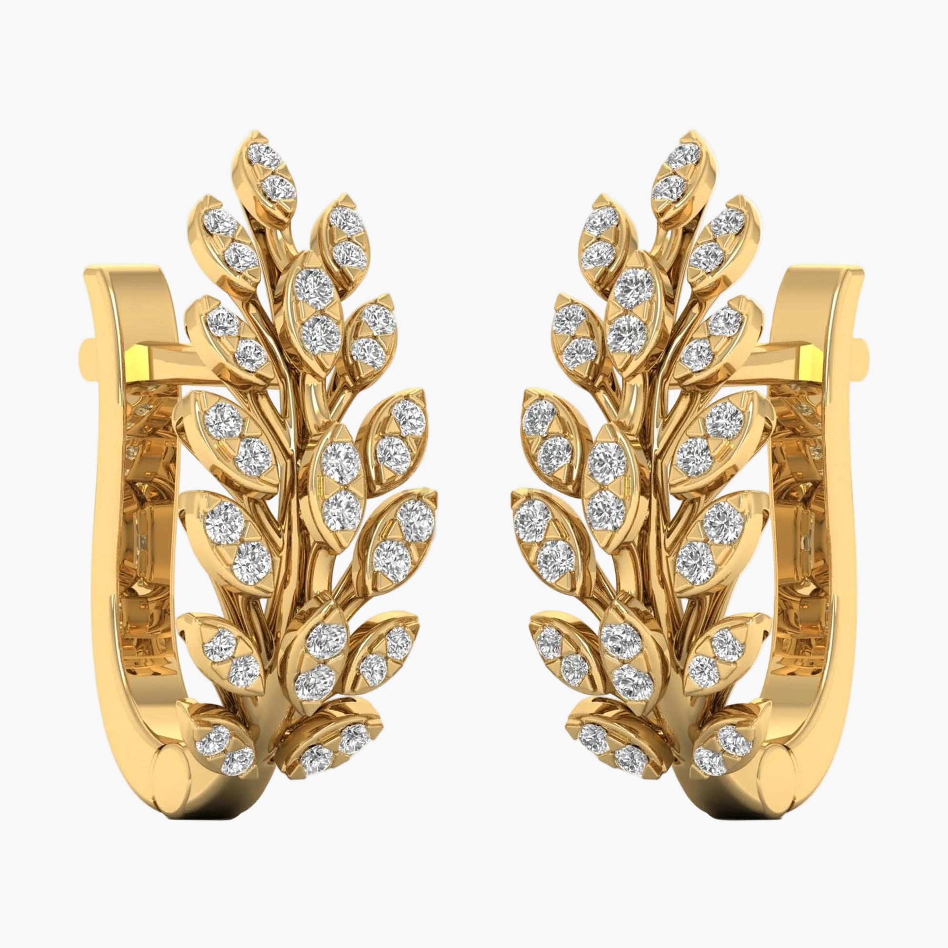 Gold earrings with leaf design and embedded diamonds on a white background