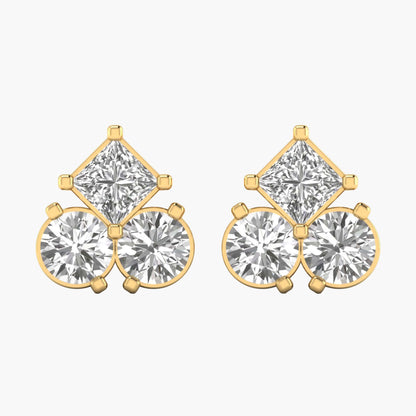 Gold and diamond earrings on a white background