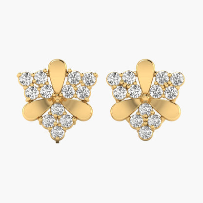 Gold earrings with diamond-like stones on a white background