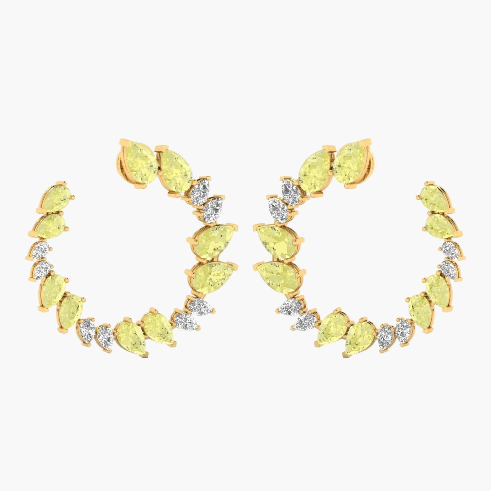 Gold earrings with yellow gemstones on a white background