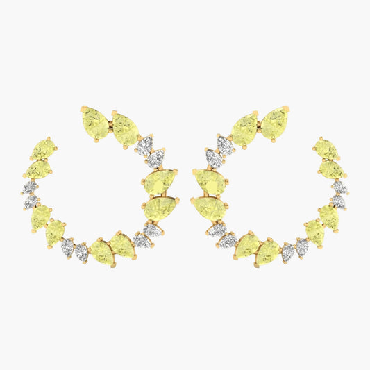 Pair of yellow gemstone hoop earrings on a white background