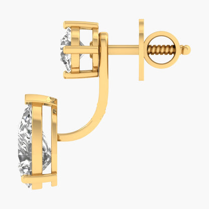 Gold earring with clear gemstone on a white background