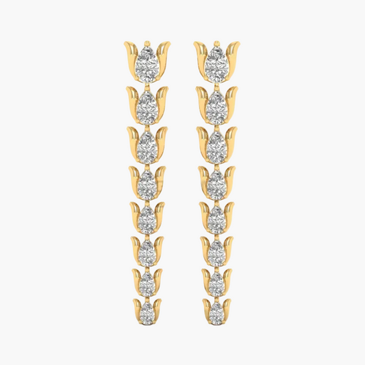 A pair of gold and diamond drop earrings on a plain white background. Each earring features a vertical chain of tulip-shaped settings with pear-cut diamonds.