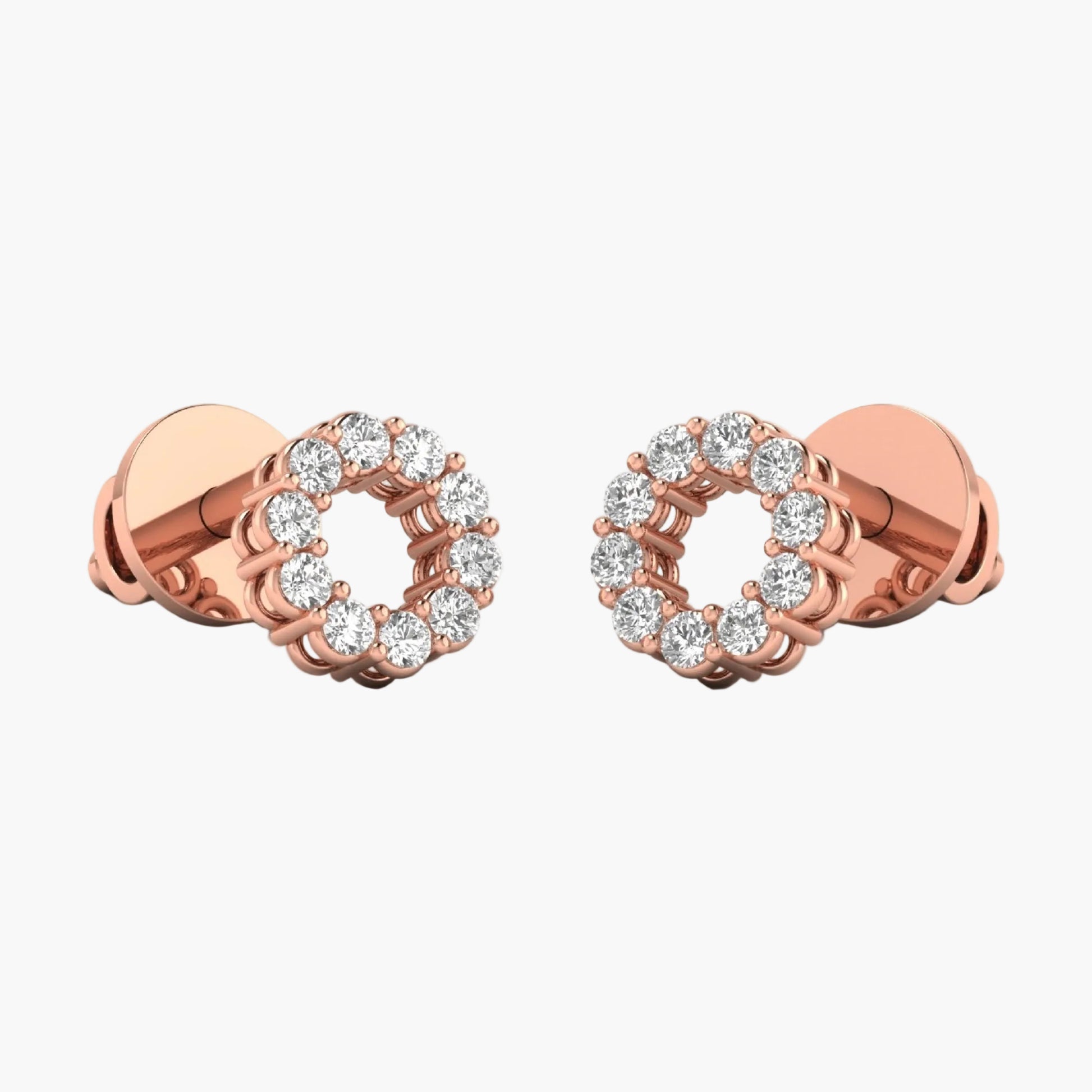 Rose gold earrings with diamond accents on a white background