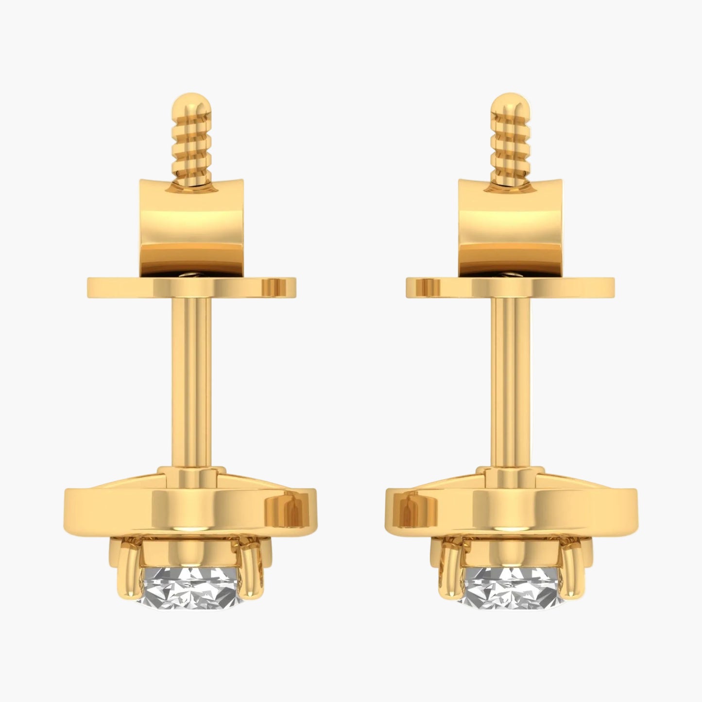 Pair of gold earrings with clear gemstones on a white background