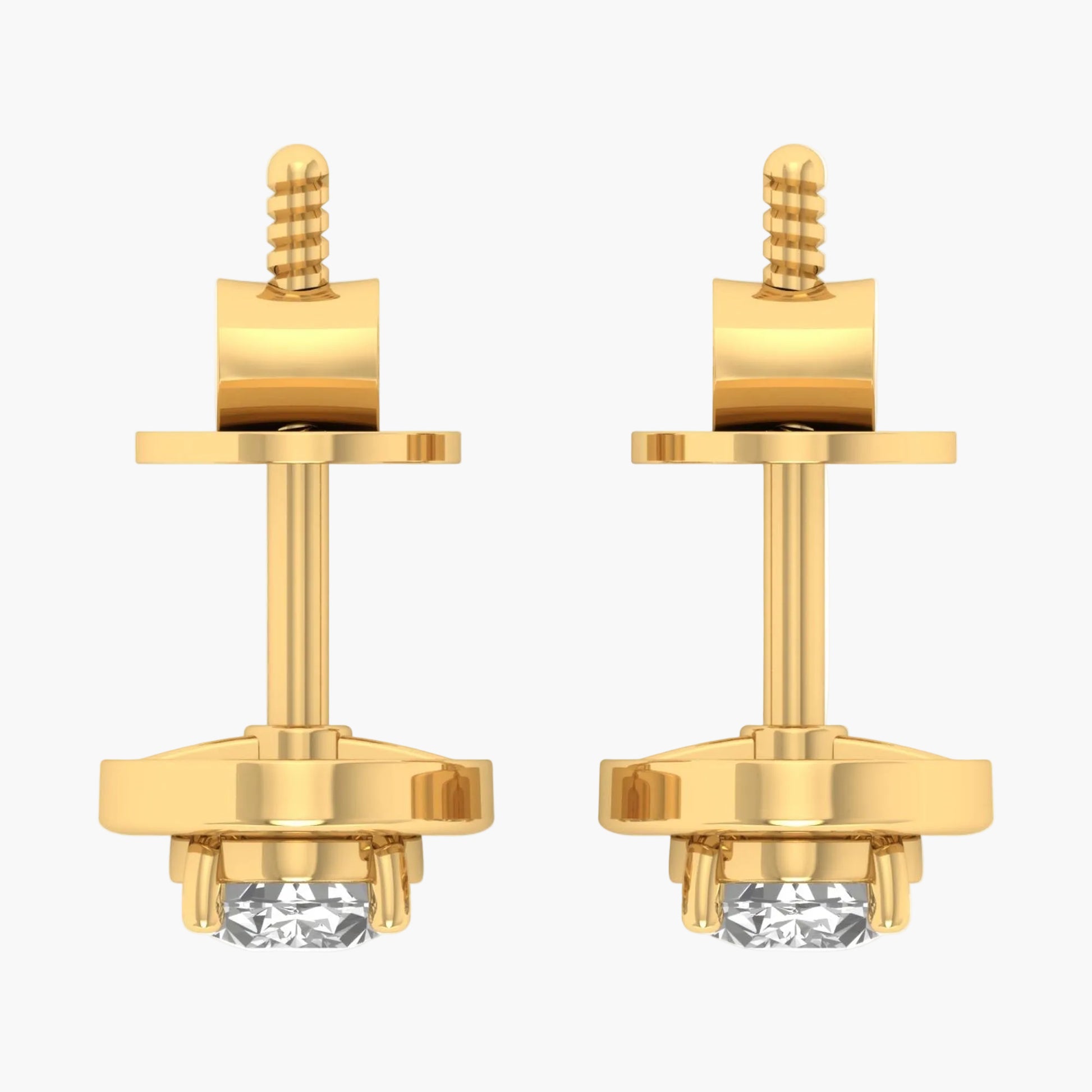 Pair of gold earrings with clear gemstones on a white background
