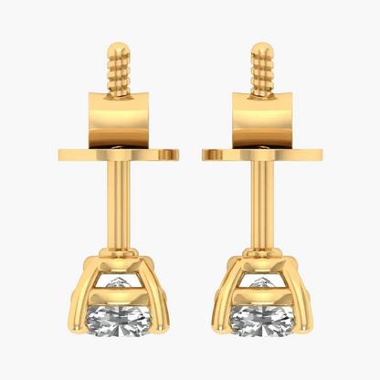 A pair of gold stud earrings with a geometric prong setting and a clear round-cut gemstone, shown on a plain white background.