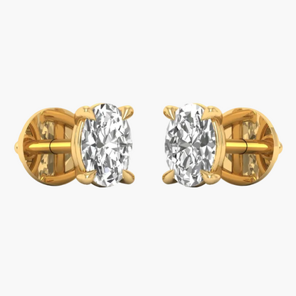 A pair of yellow gold stud earrings with oval-cut clear gemstones in a prong setting, shown on a plain white background with a faint 'GREAT LAB' watermark across the center.