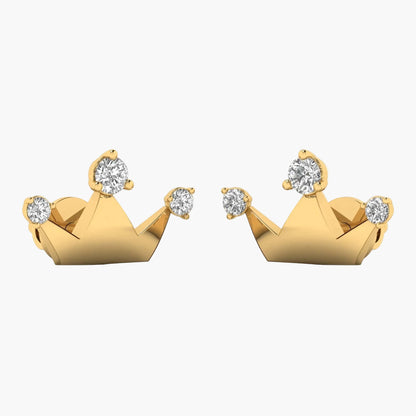 Gold crown-shaped earrings with diamonds on a white background