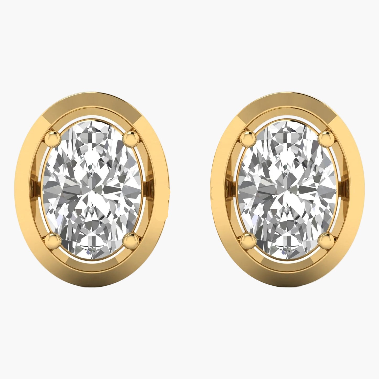Gold earrings with clear gemstones on a white background