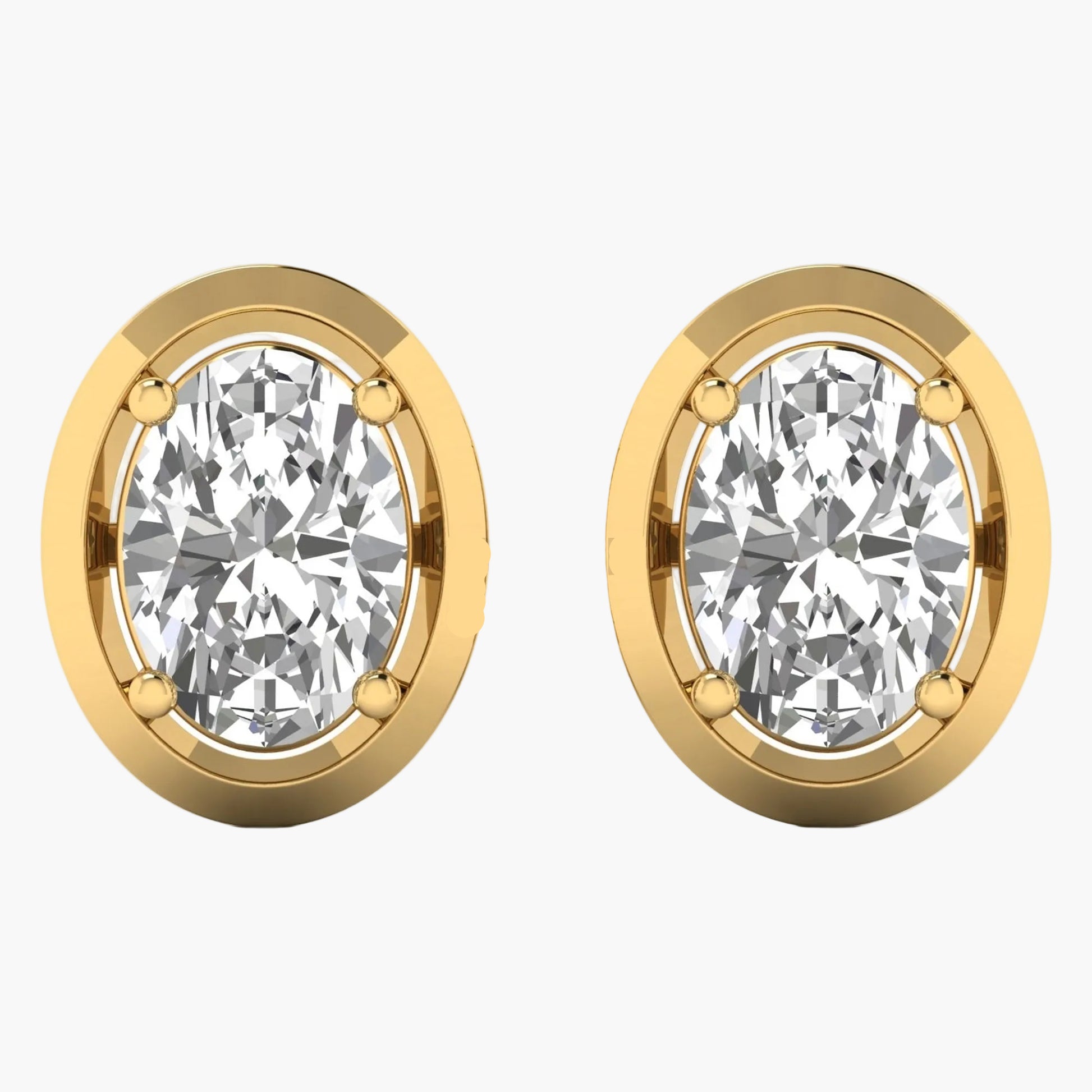 Gold earrings with clear gemstones on a white background