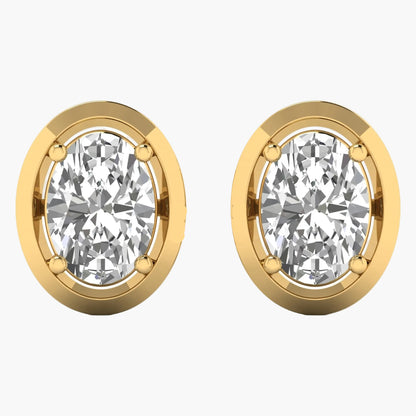 Gold earrings with clear gemstones on a white background