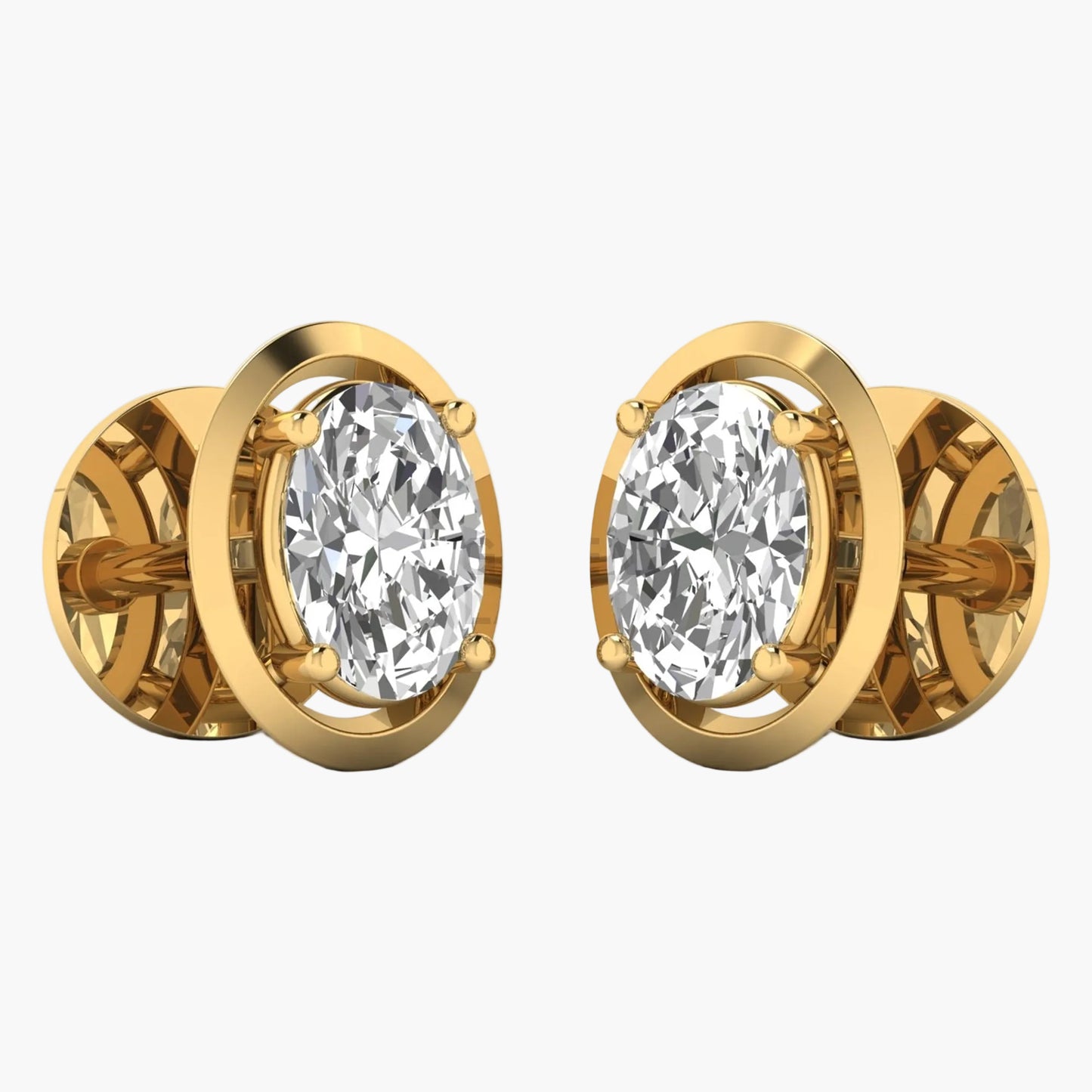 Gold earrings with clear gemstones on a white background