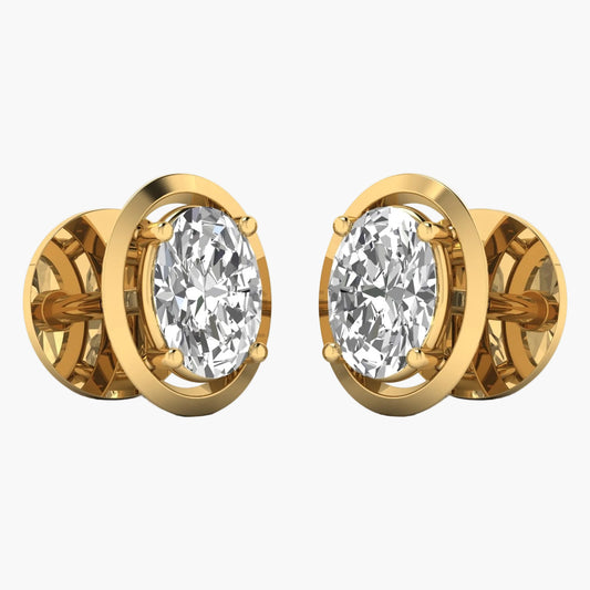 Gold earrings with clear gemstones on a white background