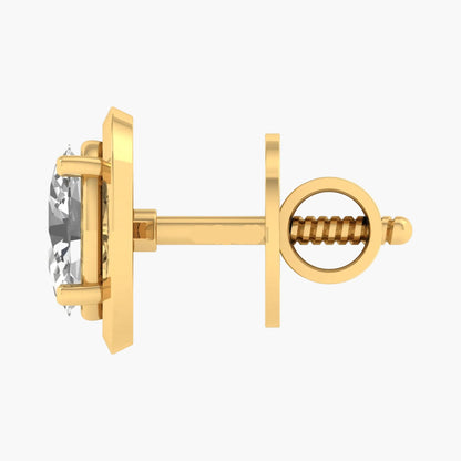 Gold earring with a clear gemstone on a white background