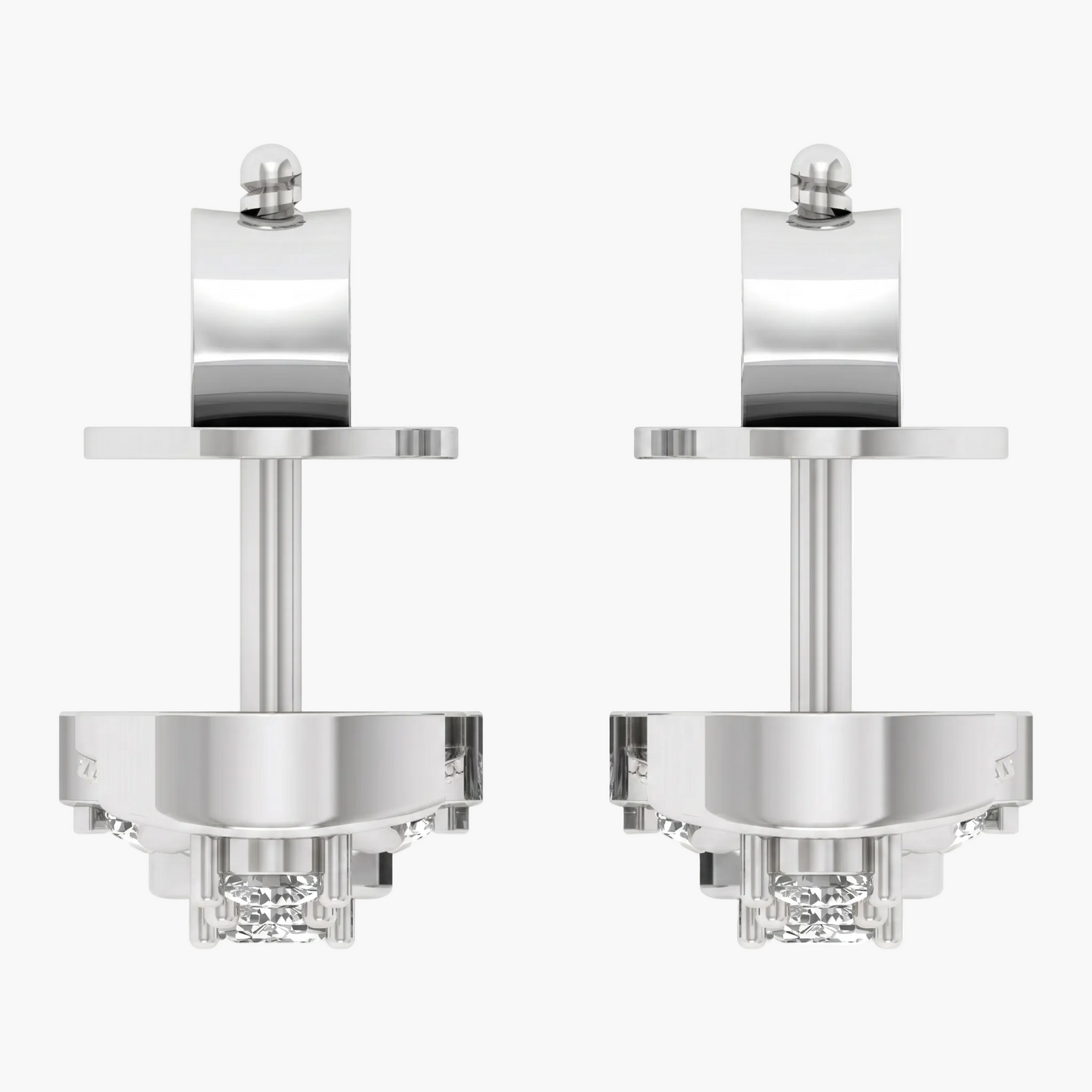 Pair of silver earrings with clear gemstones on a white background