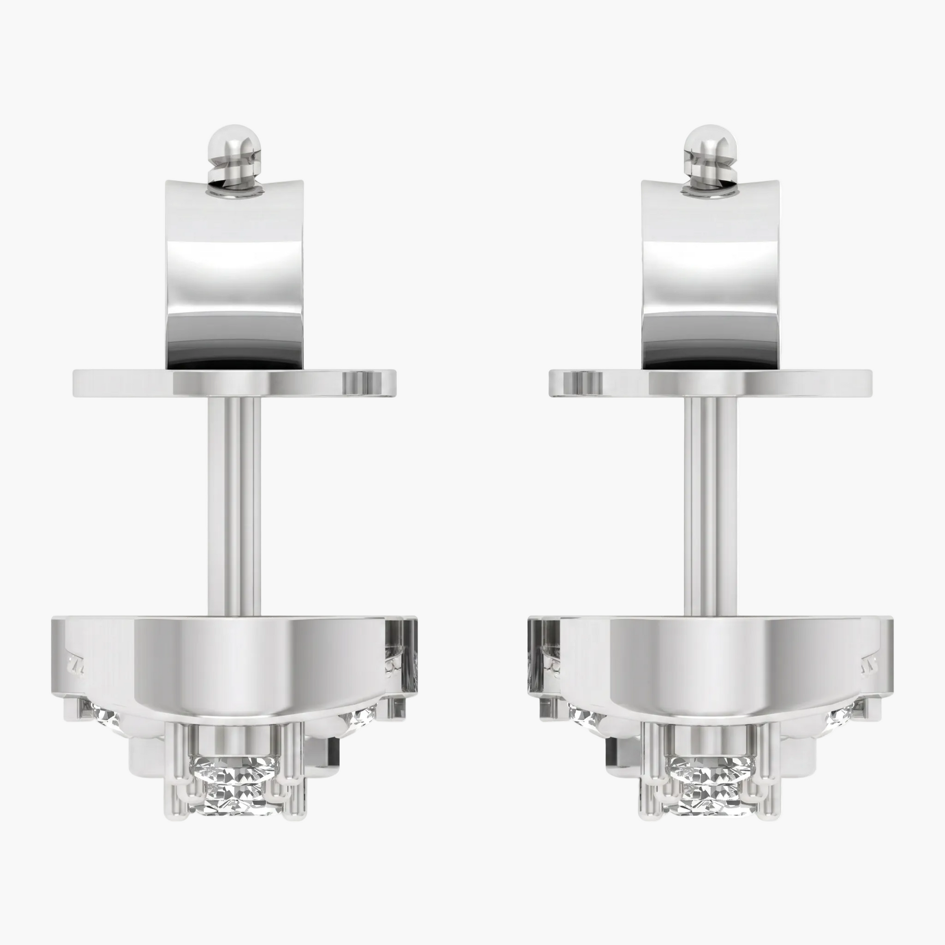 Pair of silver earrings with clear gemstones on a white background