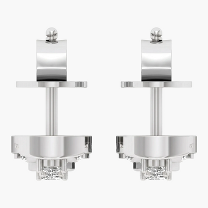 Pair of silver earrings with clear gemstones on a white background