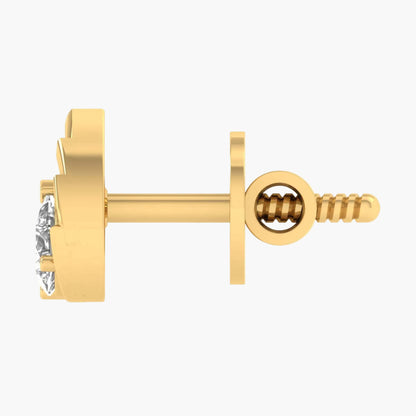 Gold earring with a clear gemstone on a white background