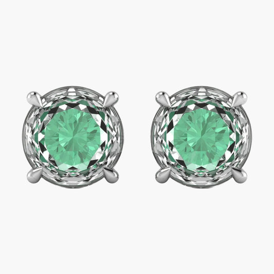Pair of silver earrings with green gemstones on a white background