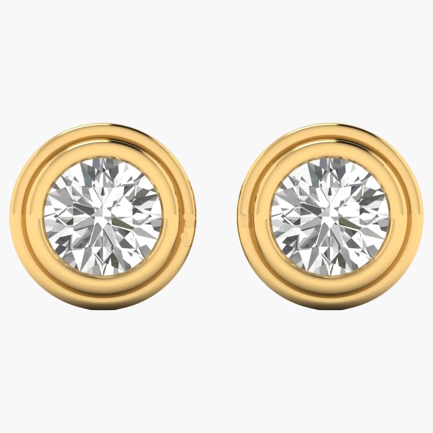 Gold earrings with clear gemstones on a white background