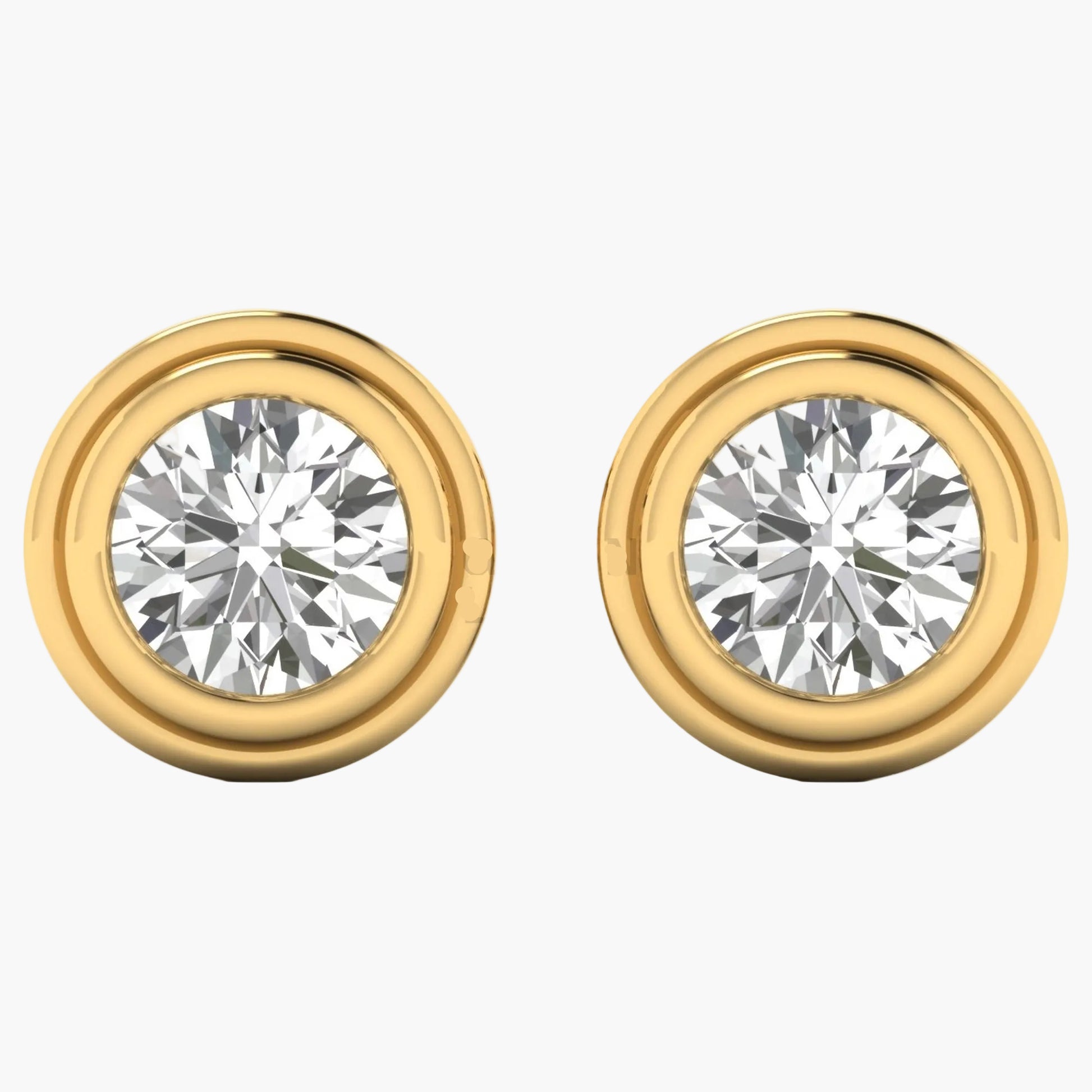 Gold earrings with clear gemstones on a white background