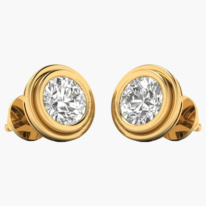 Gold earrings with clear gemstones on a white background