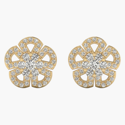 Gold earrings with diamond accents on a white background