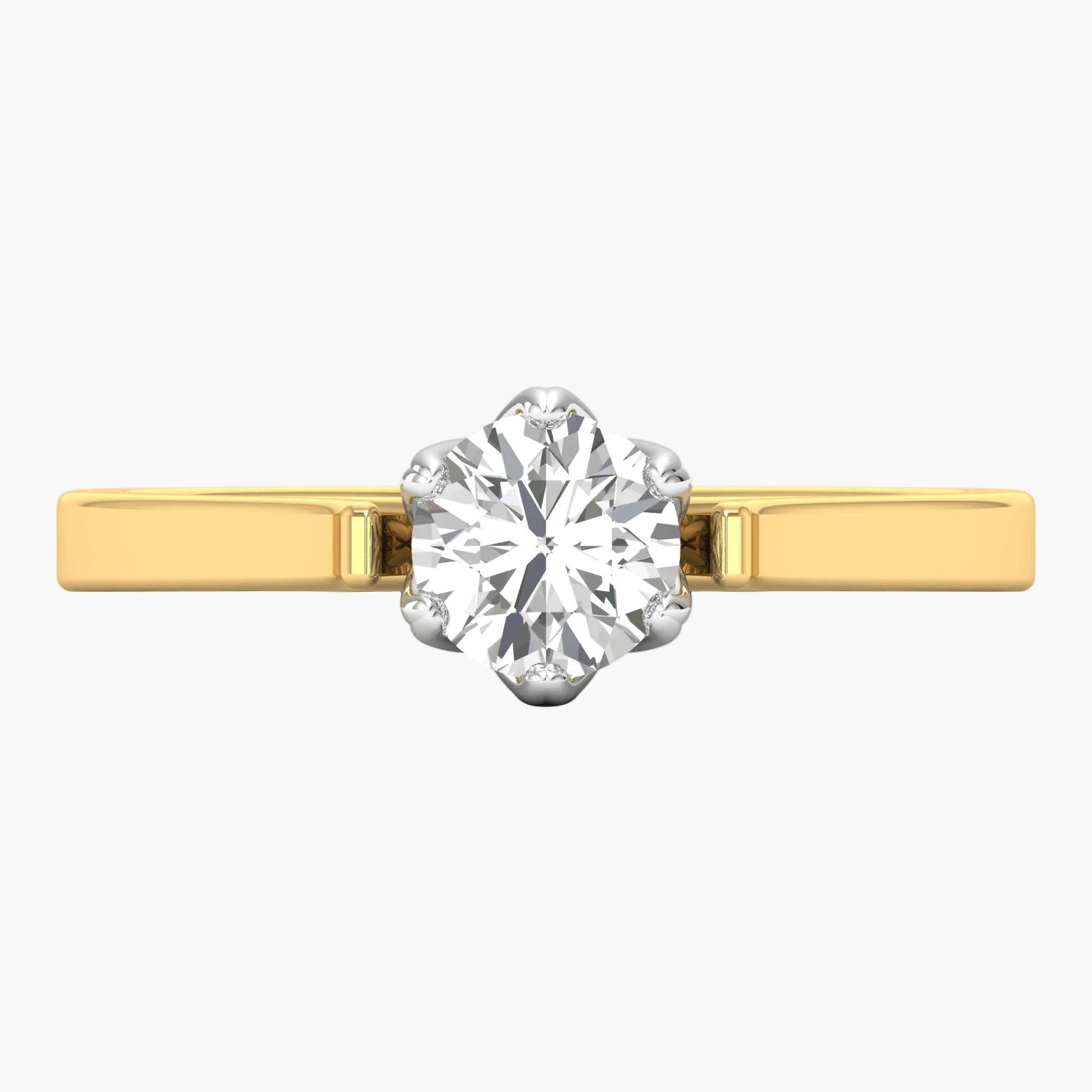Gold ring with a large diamond on a white background