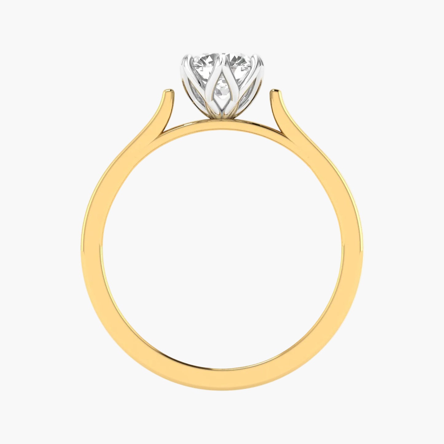 Gold ring with a diamond on a white background