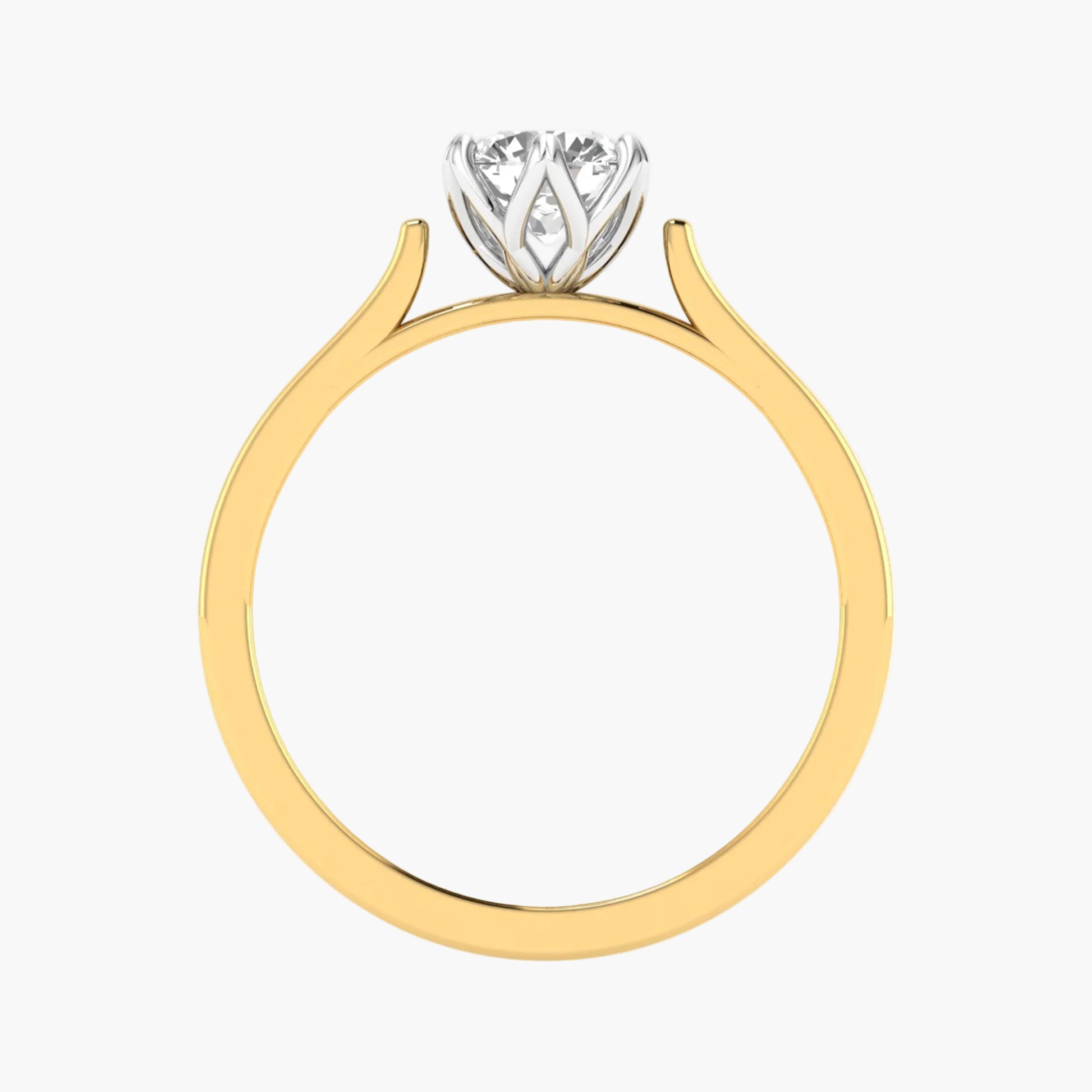 Gold ring with a diamond on a white background