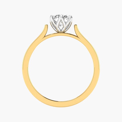 Gold ring with a diamond on a white background
