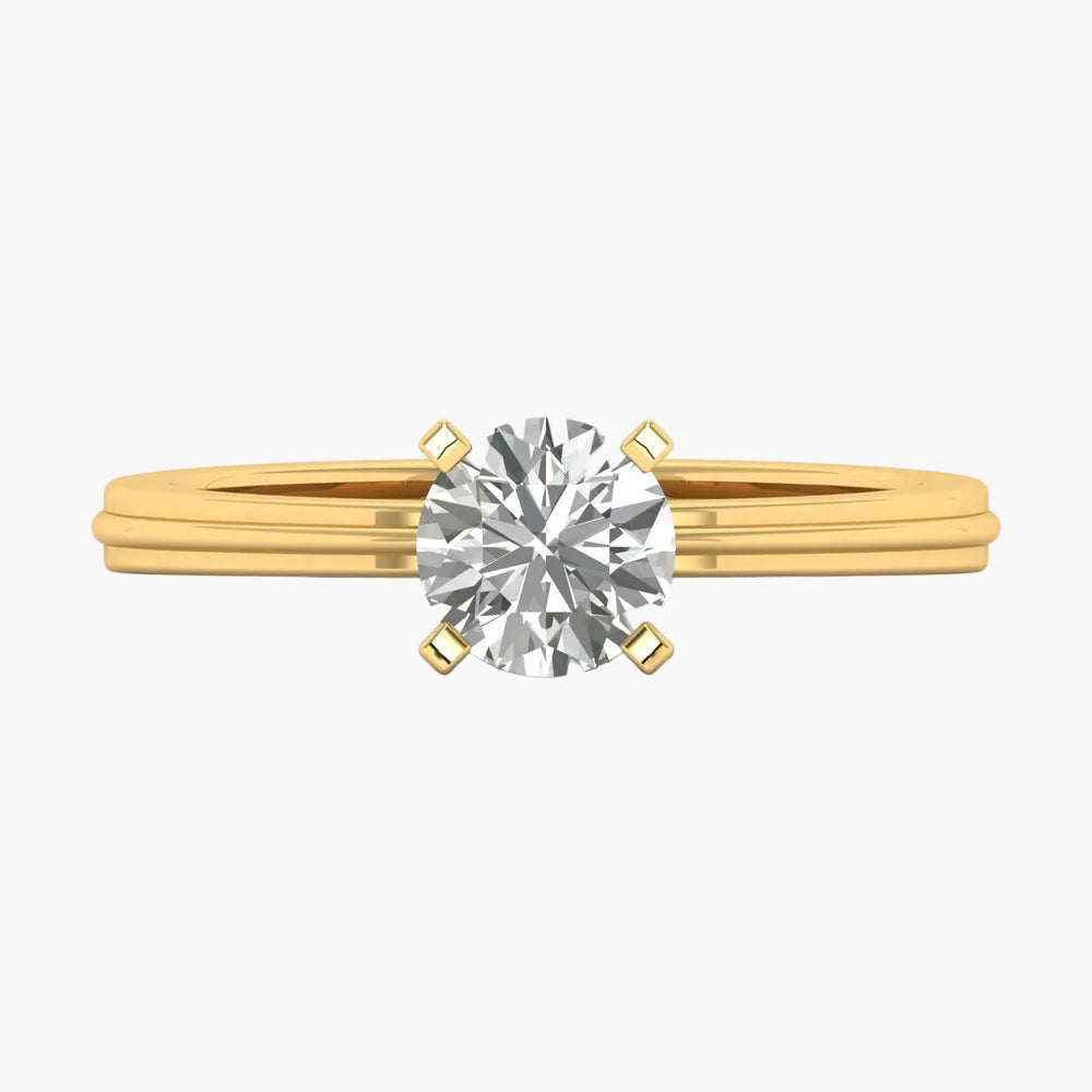 Gold ring with a diamond on a white background