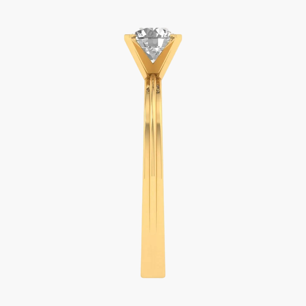 Gold hair stick with a clear gemstone on a white background