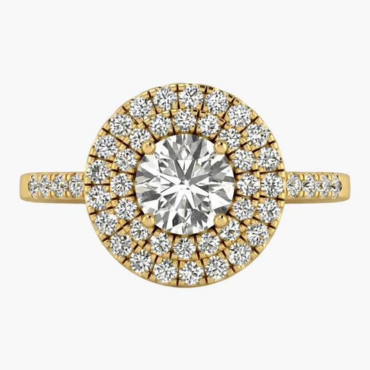Gold and diamond ring on a white background