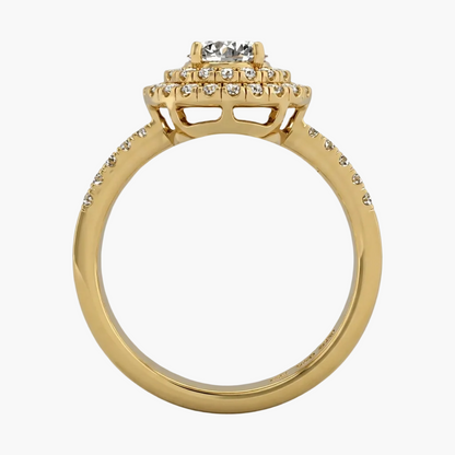 Gold ring with diamond accents on a gray background