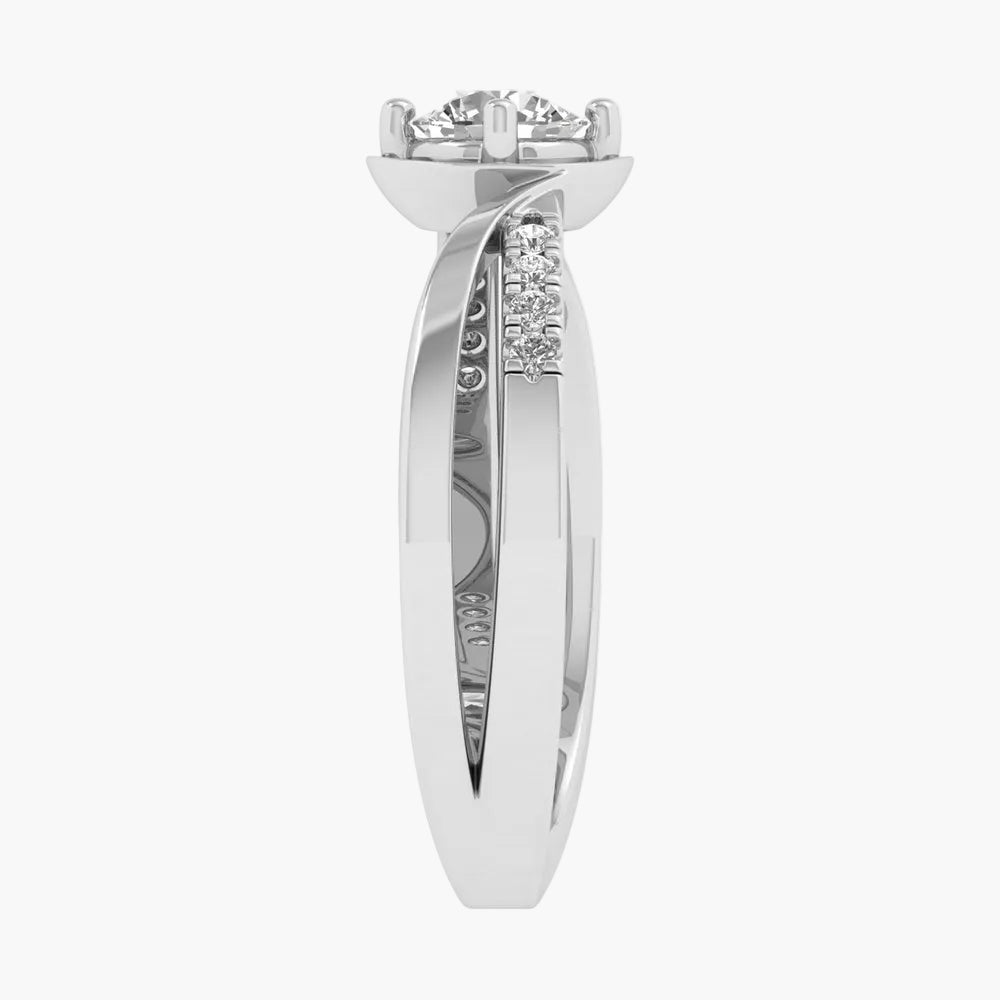 Silver ring with diamond accents on a white background