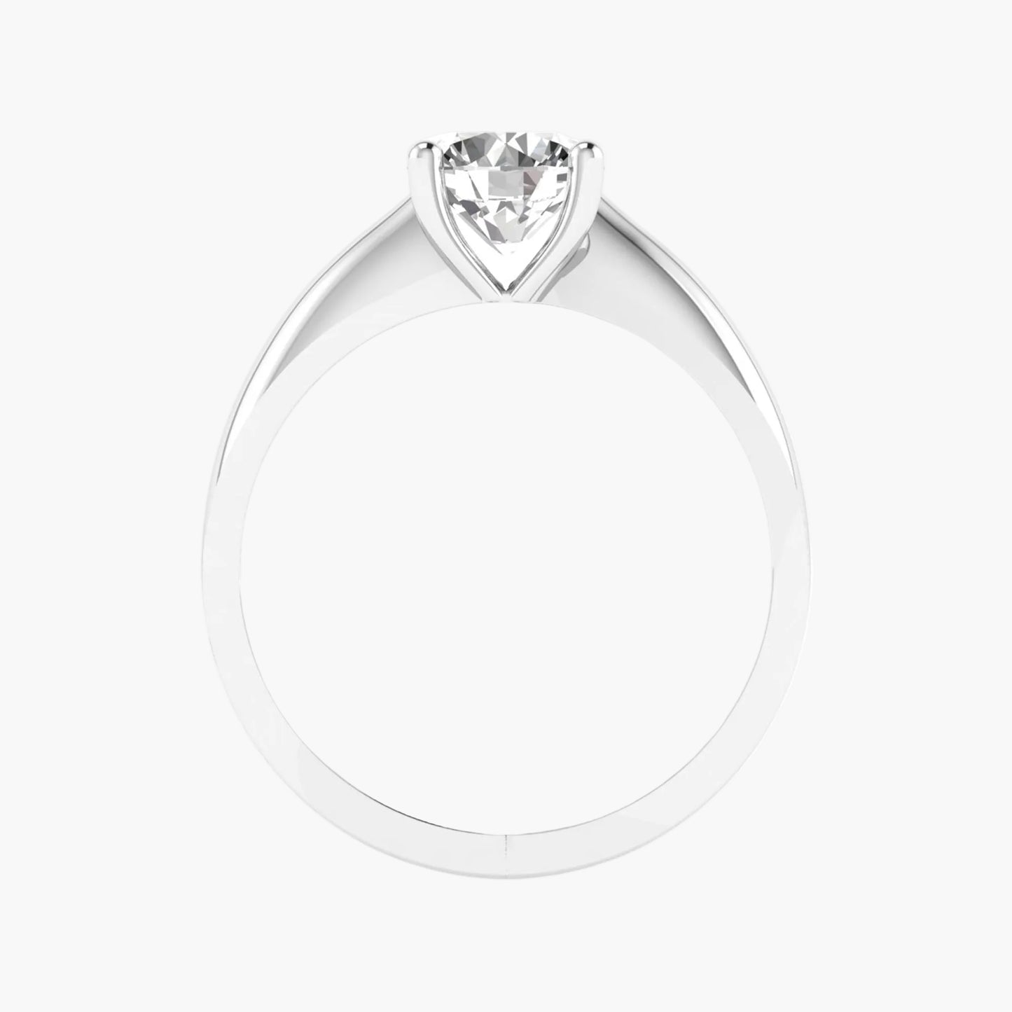 Silver ring with a heart-shaped diamond on a white background