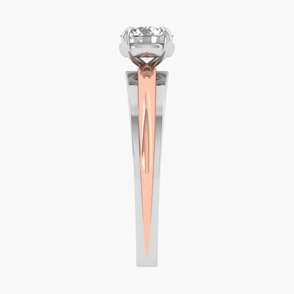 Rose gold and silver ring with a large gemstone on a white background